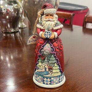 Jim Shore Festive Red and Blue Santa Figurine called The Nature of Christmas.